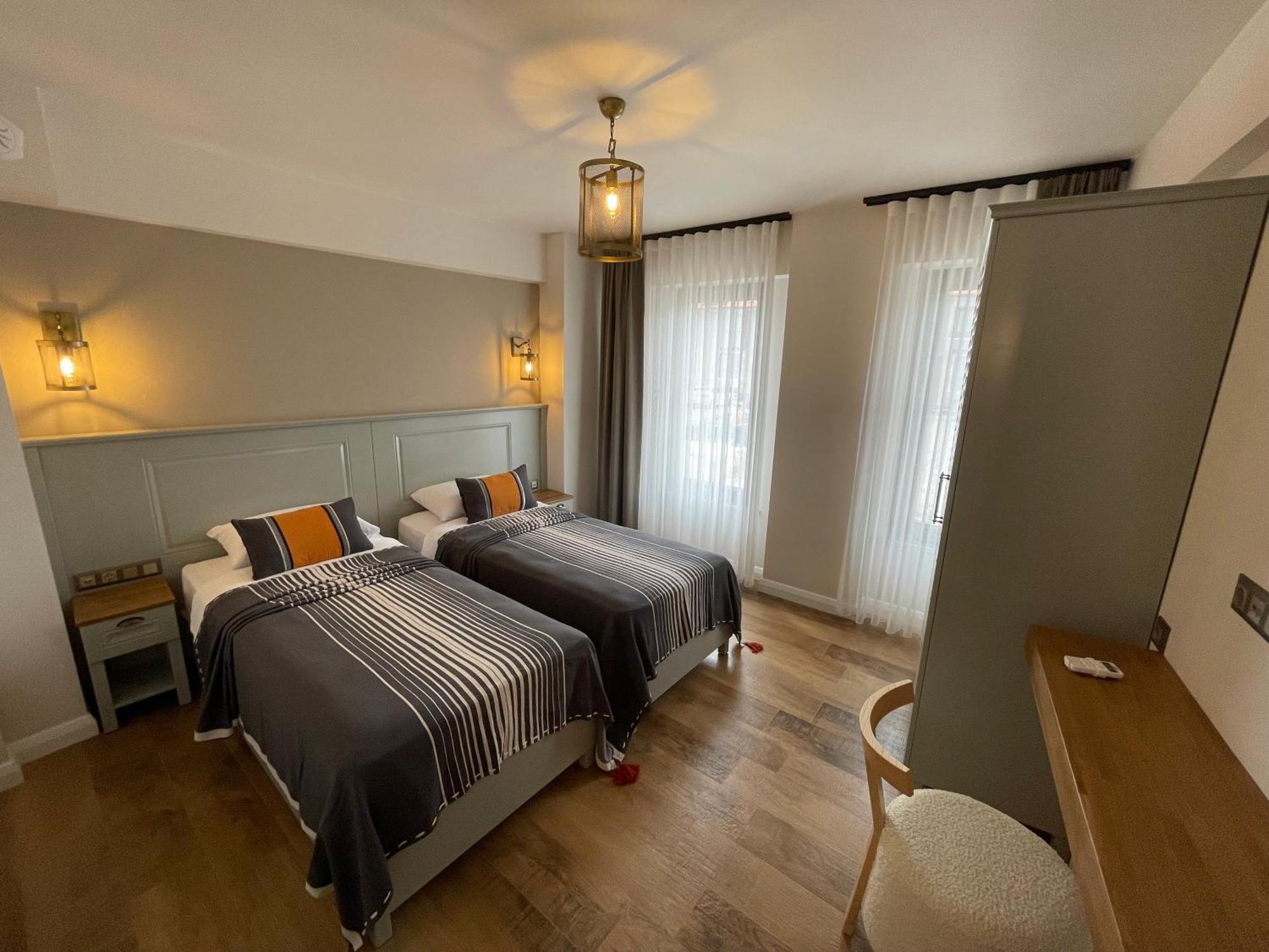 Oikos Bozcaada Aparthotel Quarto foto