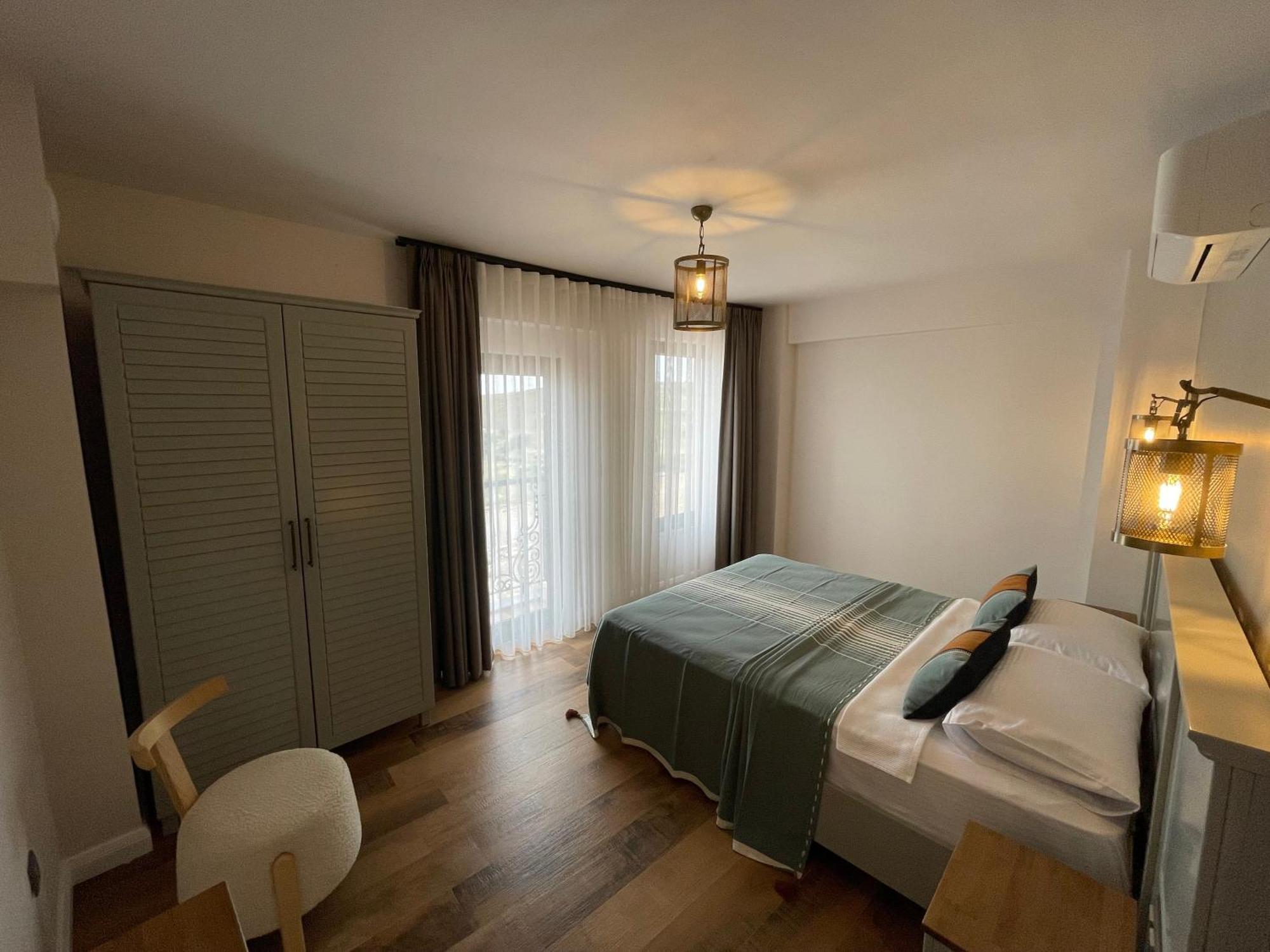 Oikos Bozcaada Aparthotel Quarto foto